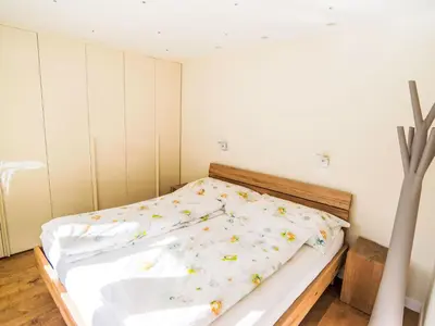 Ein Bett oder Betten in einem Zimmer der Unterkunft Apartment Cristal-9 by Interhome