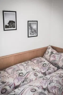 Ein Bett oder Betten in einem Zimmer der Unterkunft Apartment Venetz-2 by Interhome