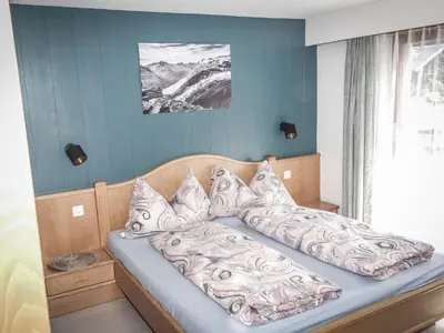Ein Bett oder Betten in einem Zimmer der Unterkunft Apartment Venetz-2 by Interhome