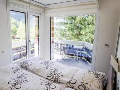 Ein Bett oder Betten in einem Zimmer der Unterkunft Apartment Flaminia 39 by Interhome