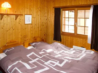 Ein Bett oder Betten in einem Zimmer der Unterkunft Holiday Home Edelweiss-2 by Interhome