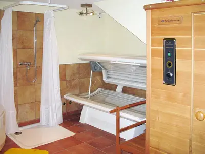 Ein Etagenbett oder Etagenbetten in einem Zimmer der Unterkunft Apartment Haus Quelle-6 by Interhome