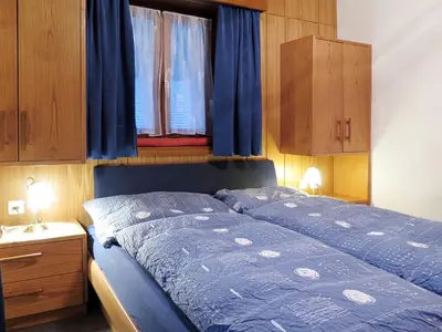Ein Bett oder Betten in einem Zimmer der Unterkunft Apartment Haus Quelle-3 by Interhome