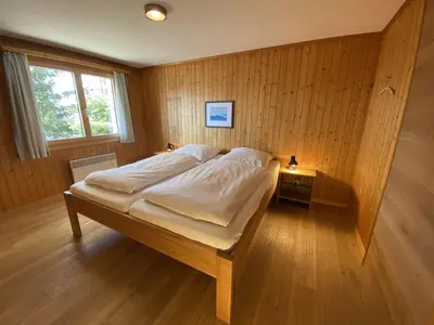 Ein Bett oder Betten in einem Zimmer der Unterkunft Chalet Chalet Soldanella - BEL205 by Interhome