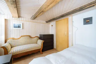 Ein Bett oder Betten in einem Zimmer der Unterkunft Charming Swiss Chalet Andermatt