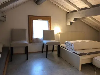 Ein Bett oder Betten in einem Zimmer der Unterkunft Charming Swiss Chalet Andermatt