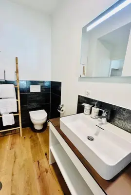 Ein Badezimmer in der Unterkunft Hotel des Alpes