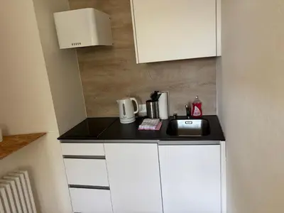Küche/Küchenzeile in der Unterkunft Hotel des Alpes