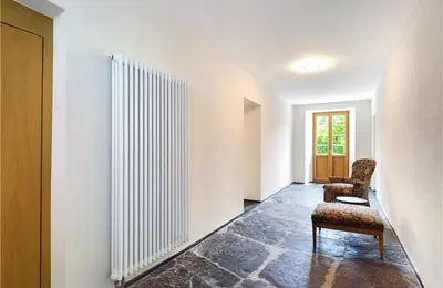 Ein Sitzbereich in der Unterkunft Hotel des Alpes