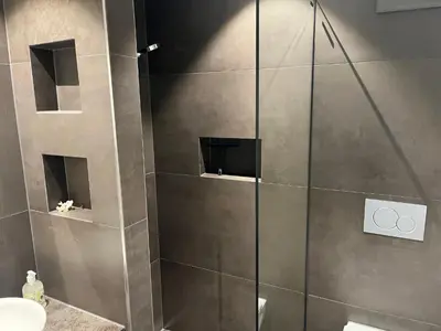 Ein Badezimmer in der Unterkunft Neue Wohnung in der Nähe vom Oeschinensee und der Jungfrau Region