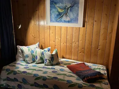 Ein Bett oder Betten in einem Zimmer der Unterkunft Engel Ingold Lodge Chalet 