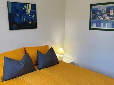 Ein Bett oder Betten in einem Zimmer der Unterkunft Engel Ingold Lodge Chalet 