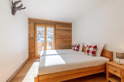 Ein Bett oder Betten in einem Zimmer der Unterkunft Les Mayens MB 021 - LUXURY apartment 18 pers