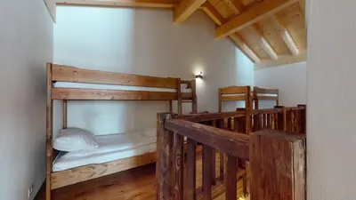 Ein Bett oder Betten in einem Zimmer der Unterkunft Les Mayens MA 021 - LUXURY apartment 18 pers