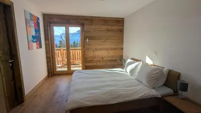 Ein Bett oder Betten in einem Zimmer der Unterkunft Les Mayens MA 022 - LUXURY apart
