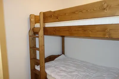 Ein Bett oder Betten in einem Zimmer der Unterkunft Les Mayens MB 012 - LUXURY apartment 8 pers