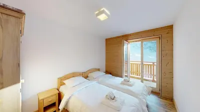 Ein Bett oder Betten in einem Zimmer der Unterkunft Les Mayens MB 011 - LUXURY apartment 6 pers