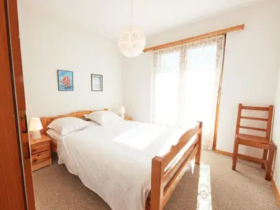 Ein Bett oder Betten in einem Zimmer der Unterkunft Apartment Grand Vue by Interhome