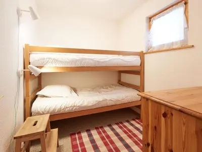 Ein Bett oder Betten in einem Zimmer der Unterkunft Apartment Grand Vue by Interhome