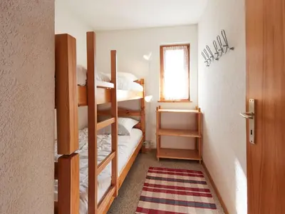Ein Bett oder Betten in einem Zimmer der Unterkunft Apartment Grand Vue by Interhome