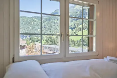 Ein Bett oder Betten in einem Zimmer der Unterkunft Lauterbrunnen Central 1