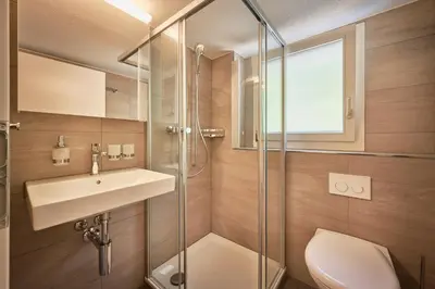 Ein Badezimmer in der Unterkunft Lauterbrunnen Central 1