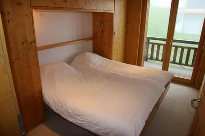 Ein Bett oder Betten in einem Zimmer der Unterkunft Plein Ciel VB 033 - MOUNTAIN apartment 8 pers