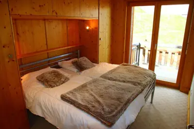 Ein Bett oder Betten in einem Zimmer der Unterkunft Plein Ciel VB 033 - MOUNTAIN apartment 8 pers