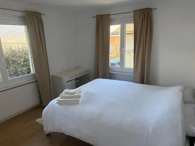 Ein Bett oder Betten in einem Zimmer der Unterkunft Appartement entier avec terrasse et jardin