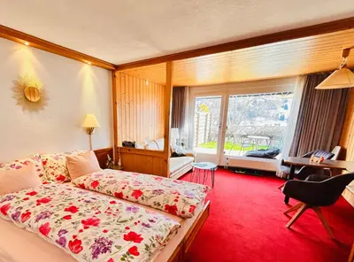 Ein Bett oder Betten in einem Zimmer der Unterkunft Adelhome Studio mit Gartensitzplatz