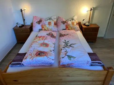 Ein Bett oder Betten in einem Zimmer der Unterkunft KARL Apartment