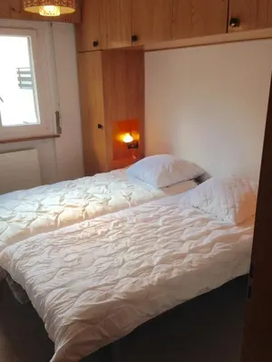 Ein Bett oder Betten in einem Zimmer der Unterkunft Combyre C 035 - COMFORTABLE apartment 6 pers