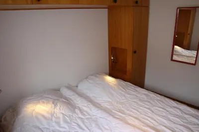 Ein Bett oder Betten in einem Zimmer der Unterkunft Combyre C 035 - COMFORTABLE apartment 6 pers