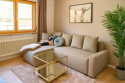 Ein Sitzbereich in der Unterkunft Ambiente Appartement C2 - moderne Ferienwohnung mit Terrasse in Leukerbad