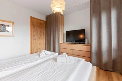 Ein Bett oder Betten in einem Zimmer der Unterkunft Appartement avec terrasse, proche du centre