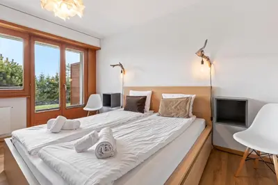 Ein Bett oder Betten in einem Zimmer der Unterkunft Appartement avec terrasse, proche du centre