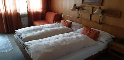 Ein Bett oder Betten in einem Zimmer der Unterkunft Bären-Krattigen