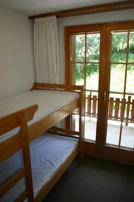 Ein Bett oder Betten in einem Zimmer der Unterkunft Mayens de l Ours AZ 013 - MOUNTAIN apartment 8p