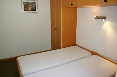 Ein Bett oder Betten in einem Zimmer der Unterkunft Mayens de l Ours AZ 013 - MOUNTAIN apartment 8p