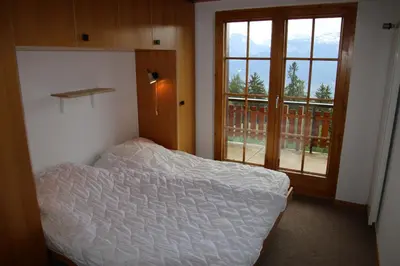 Ein Bett oder Betten in einem Zimmer der Unterkunft Mayens de l Ours DZ 131 - MOUNTAIN apartment 6 per