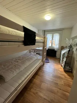 Ein Bett oder Betten in einem Zimmer der Unterkunft Nevita