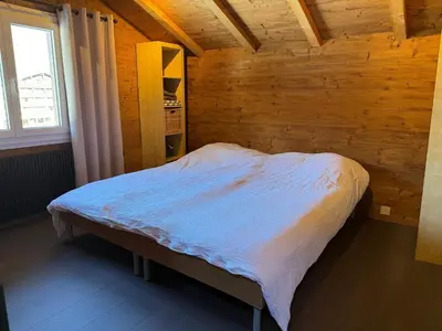 Ein Bett oder Betten in einem Zimmer der Unterkunft Nevita