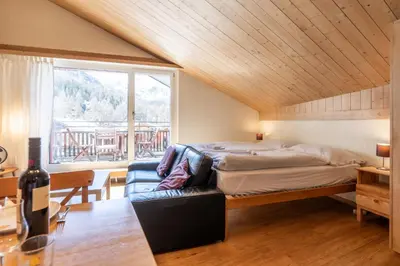 Ein Bett oder Betten in einem Zimmer der Unterkunft Eagle Horst-cozy Matterhorn view Studio by Inspiring Places Zermatt