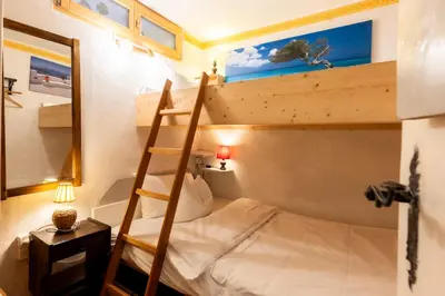 Ein Bett oder Betten in einem Zimmer der Unterkunft Apartment Familienzauber - by Inspiring Places Zermatt