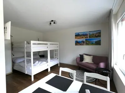 Ein Bett oder Betten in einem Zimmer der Unterkunft Red Nest