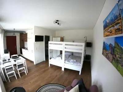 Ein Bett oder Betten in einem Zimmer der Unterkunft Red Nest