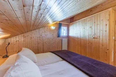Ein Bett oder Betten in einem Zimmer der Unterkunft Esperanza SKI IN & SKI OUT chalet 8 pers