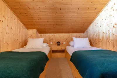 Ein Bett oder Betten in einem Zimmer der Unterkunft Esperanza SKI IN & SKI OUT chalet 8 pers