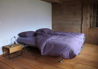 Ein Bett oder Betten in einem Zimmer der Unterkunft kulturland Retreat