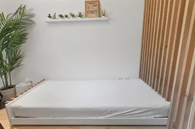 Ein Bett oder Betten in einem Zimmer der Unterkunft Élégant studio, proche des bains & nature